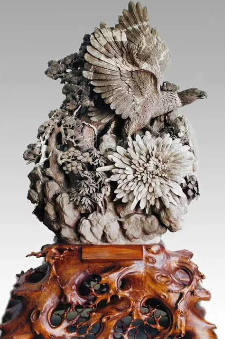 蓝狮娱乐李舟的彩色菊花石雕作品《雅居》荣获金奖